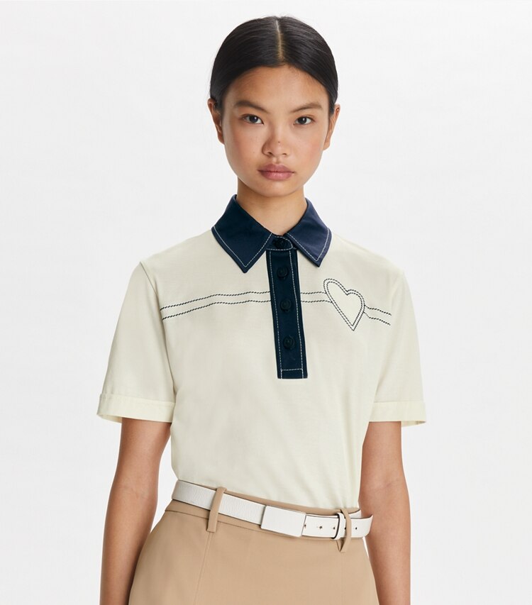 Tory Sport designer tops Heart Pickstitch Cotton Polo in New Ivory / Tory Navy on model detail