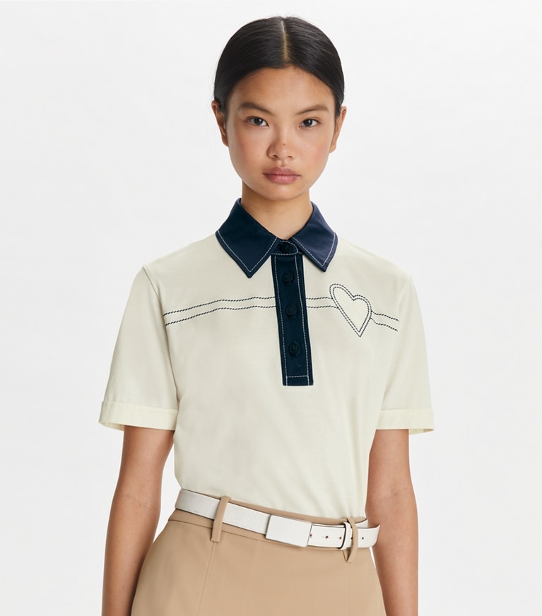 Tory Sport designer tops Heart Pickstitch Cotton Polo in New Ivory / Tory Navy front