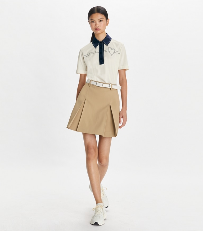 Tory Sport designer tops Heart Pickstitch Cotton Polo in New Ivory / Tory Navy front