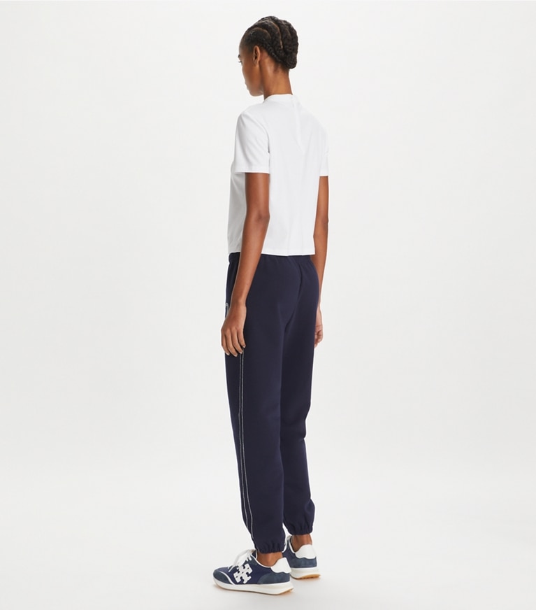 Tory Sport designer bottoms Heart Pickstitch French Terry Sweatpant in Medium Navy front