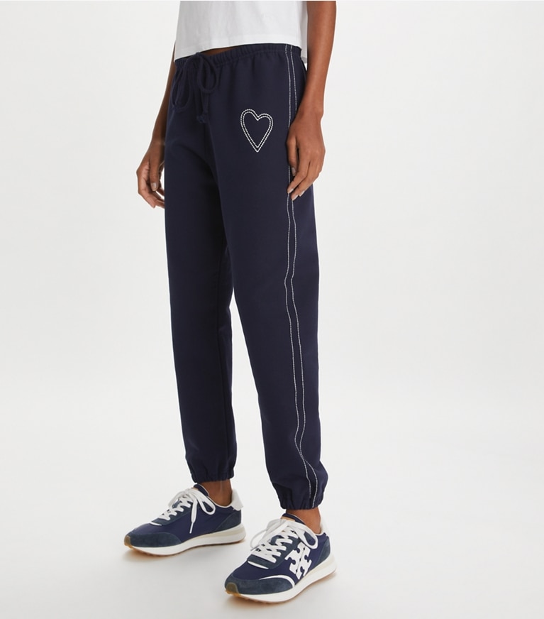 Tory Sport designer bottoms Heart Pickstitch French Terry Sweatpant in Medium Navy front