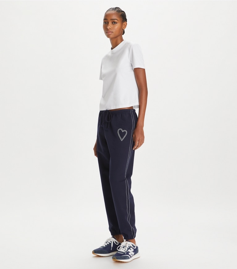 Tory Sport designer bottoms Heart Pickstitch French Terry Sweatpant in Medium Navy front