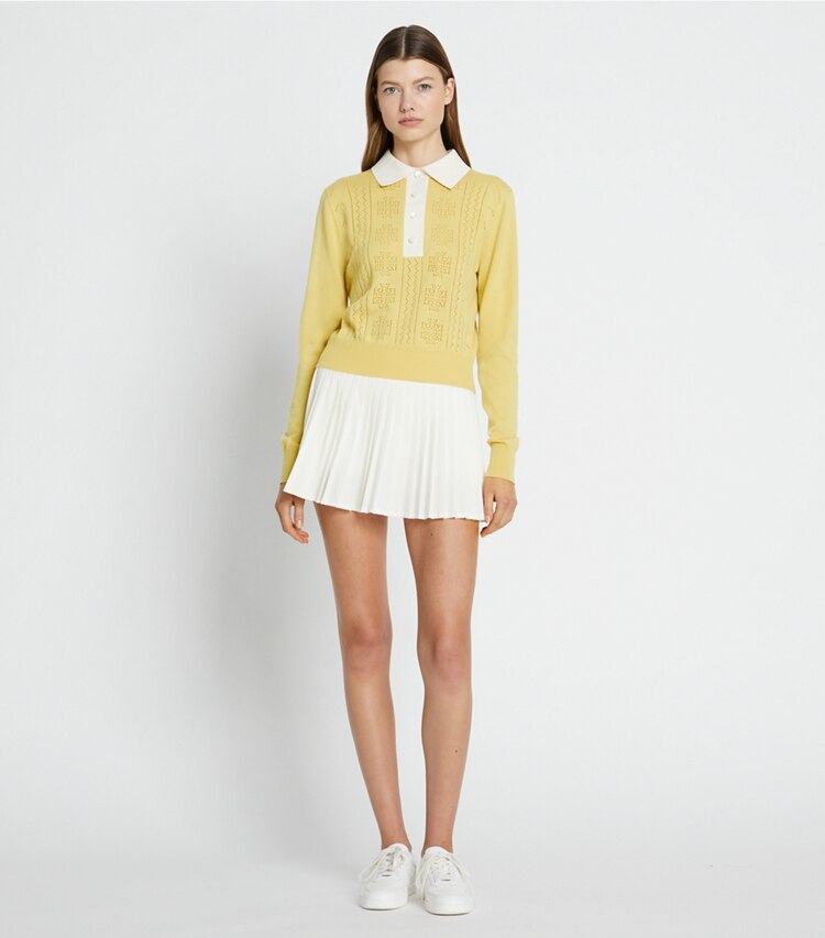 Tory Sport designer sweaters Heart Pointelle Sweater in Sweet Butter on model front