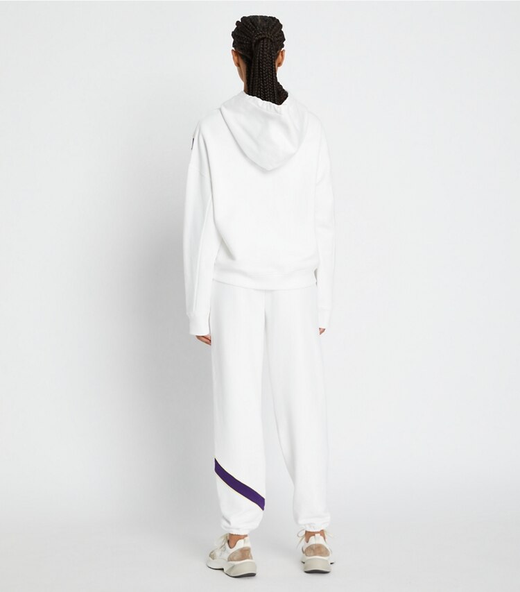 Tory Sport designer bottoms Heavy French Terry Chevron Sweatpant in Snow White / Eggplant on model back