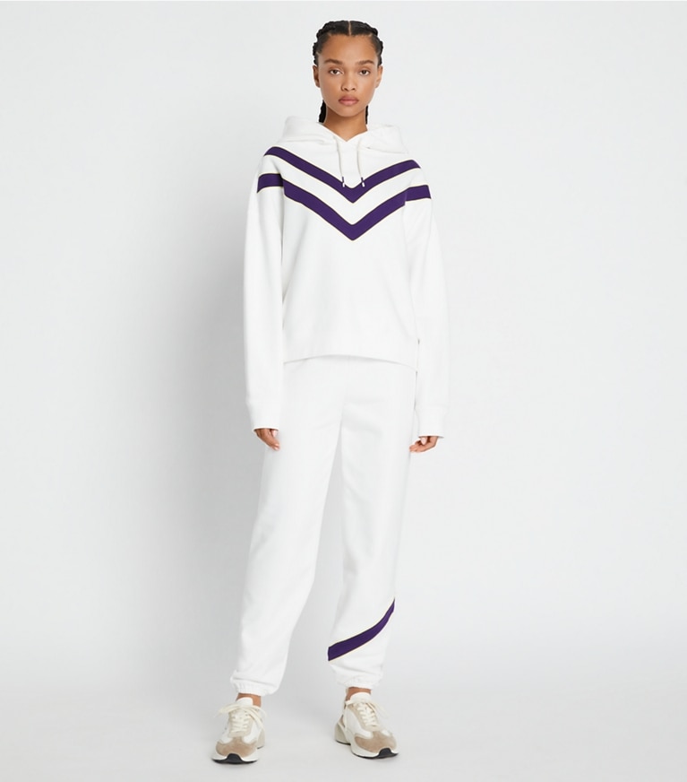Tory Sport designer bottoms Heavy French Terry Chevron Sweatpant in Snow White / Eggplant front