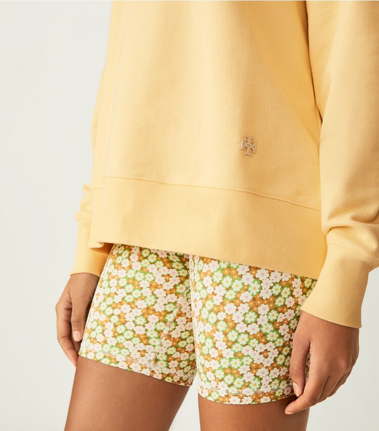 Tory Sport designer sweaters Heavy French Terry Crewneck in Light Yellow on model detail