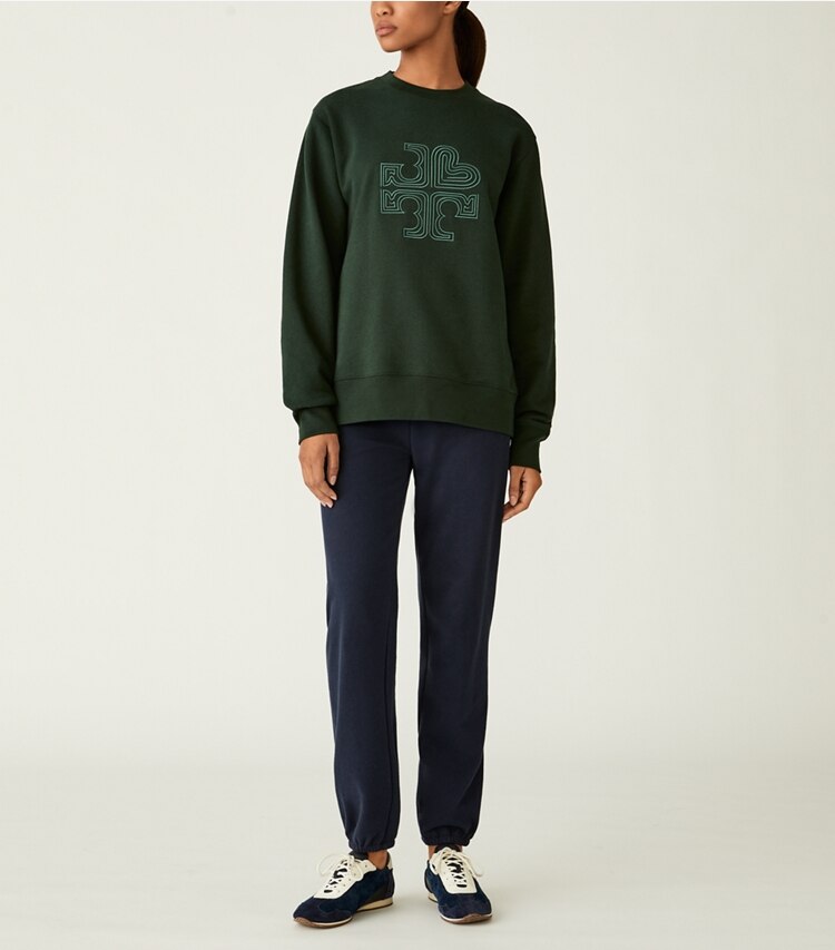 Tory Burch designer sweaters Heavy French Terry Heart Logo Crewneck in Conifer on model front