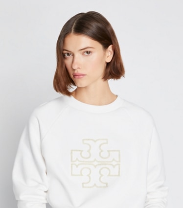 Tory Sport designer sweaters Heavy French Terry Logo Crewneck in Snow White on model detail
