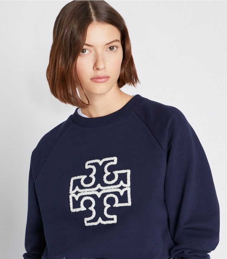 Tory Burch designer sweaters Heavy French Terry Logo Crewneck in Tory Navy on model detail