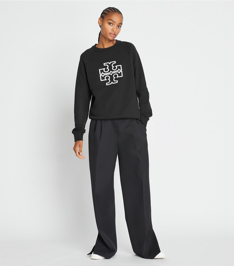 Tory Burch designer sweaters Heavy French Terry Logo Crewneck in Black on model front