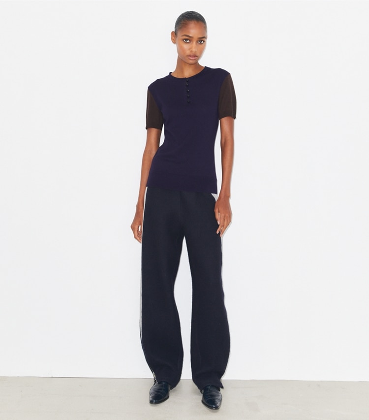 Tory Burch designer strickware Henley-Top aus Wolle in Dark Brown / Deep Blue modell von vorn