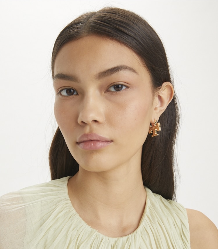 Tory Burch designer earrings Hidden Hoop Earrings in Tory Gold accessory on model