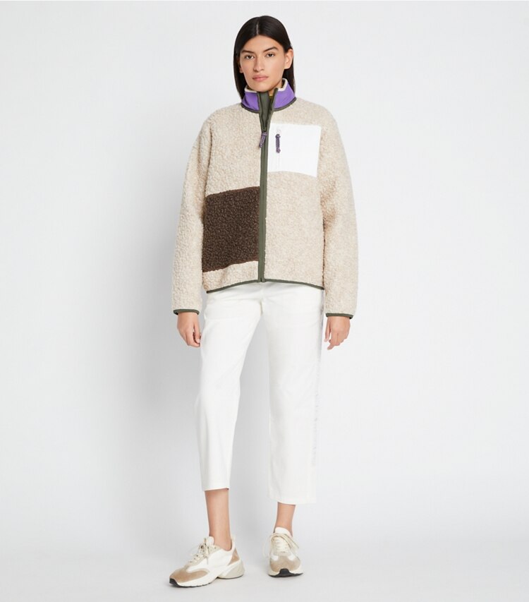 Tory Sport designer coats High-Pile Fleece Reflective Jacket in Dark Roast Heather / Natural Heather on model front