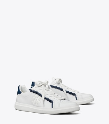 Tory Burch designer sneakers Howell Court Ruffle Sneaker in TITANIUM WHITE / NIGHT VOYAGE angle