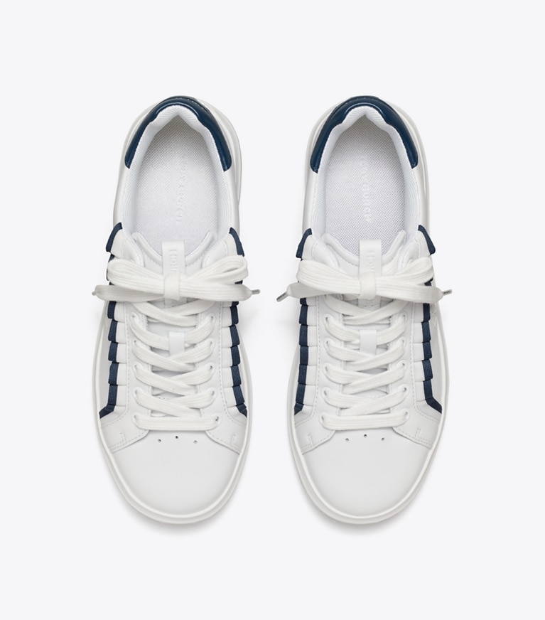 Tory Burch designer sneakers Howell Court Ruffle Sneaker in TITANIUM WHITE / NIGHT VOYAGE angle