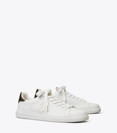 Tory Burch designer sneakers Howell Court Sneaker in Titanium White / Spark Gold angle