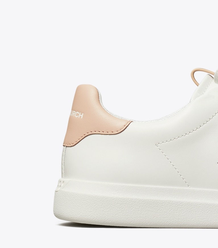 Tory Burch designer sneakers Howell Court Sneaker in TITANIUM WHITE / SHELL PINK angle
