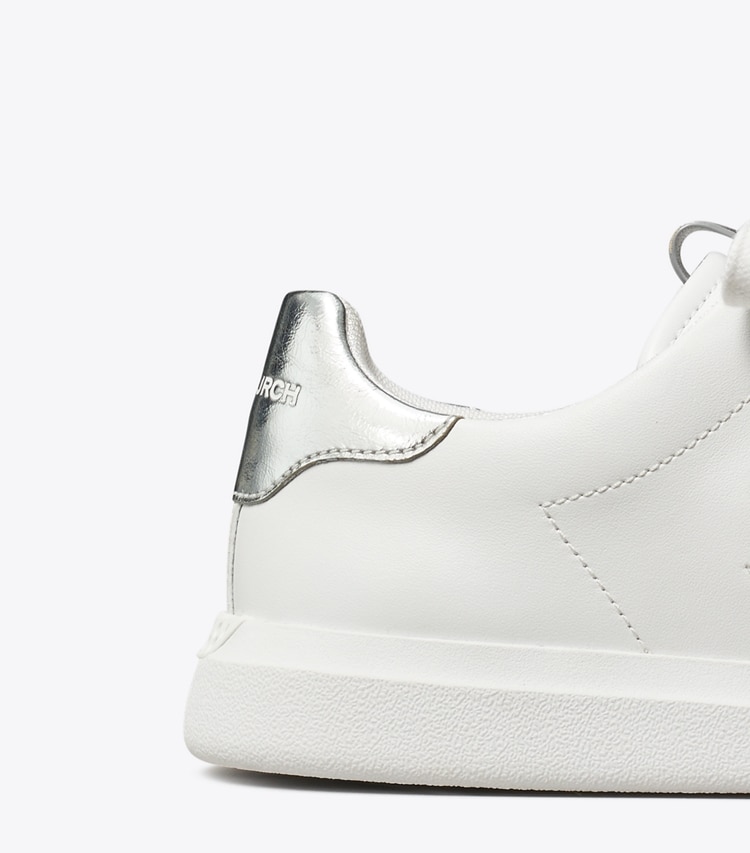 Tory Burch designer sneakers Howell Court Sneaker in Titanium White / Silver detail