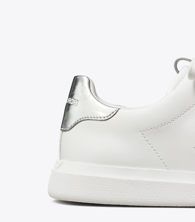 Tory Burch designer sneakers Howell Court Sneaker in Titanium White / Silver angle