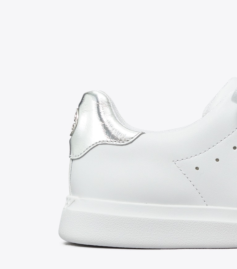 Tory Burch designer sneakers Howell Court Sneaker in Titanium White / Silver angle