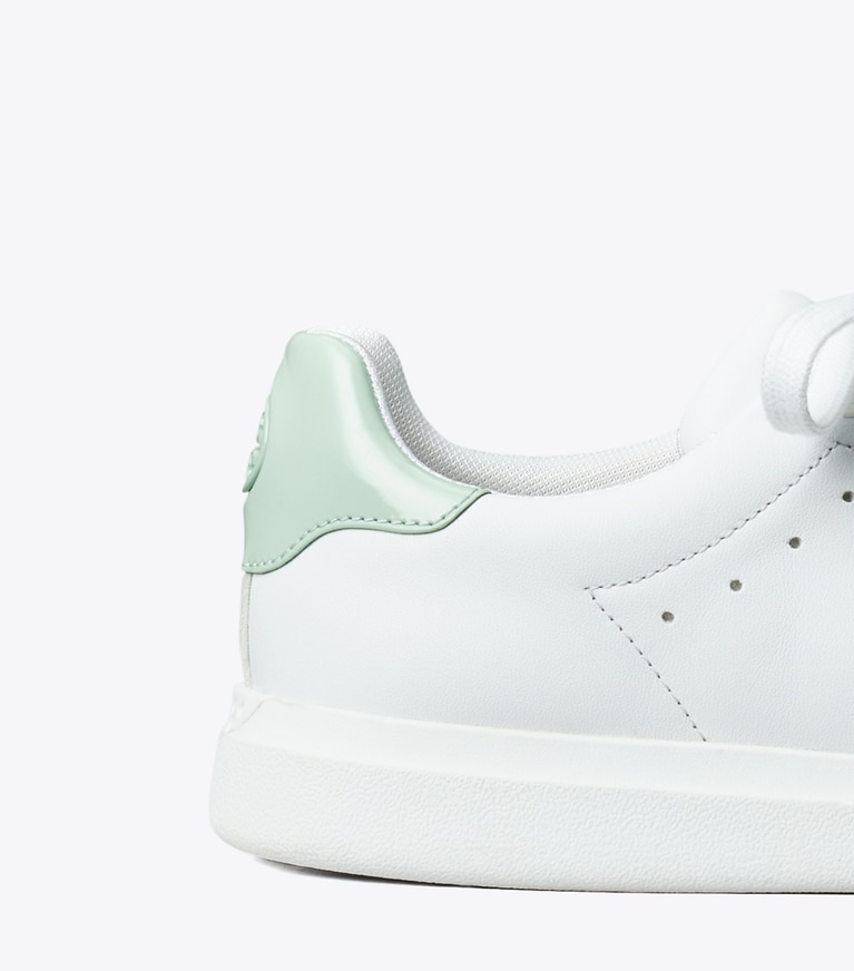 Tory Burch designer sneakers Howell Court Sneaker in Titanium White / Mint Chip angle
