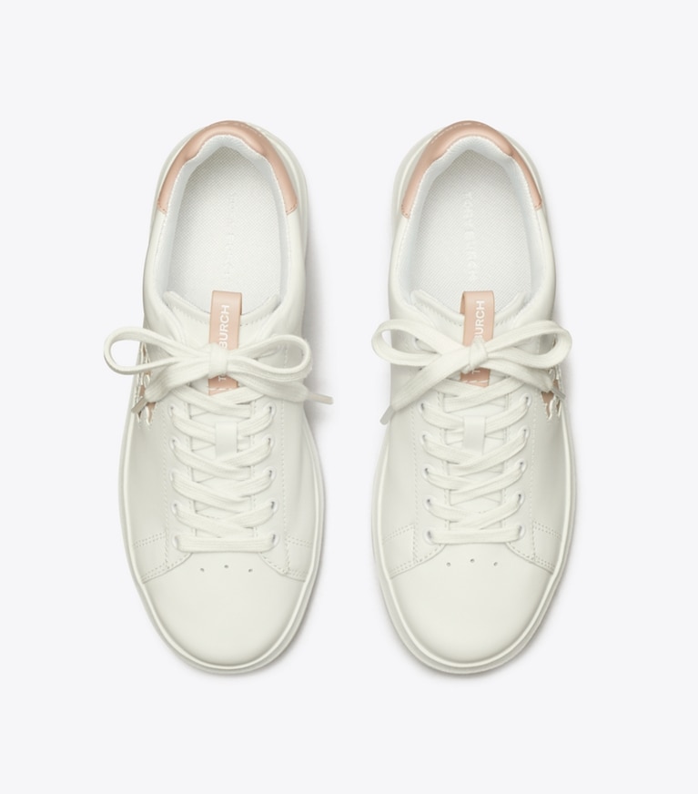 Tory Burch designer sneakers Howell Court Sneaker in TITANIUM WHITE / SHELL PINK angle