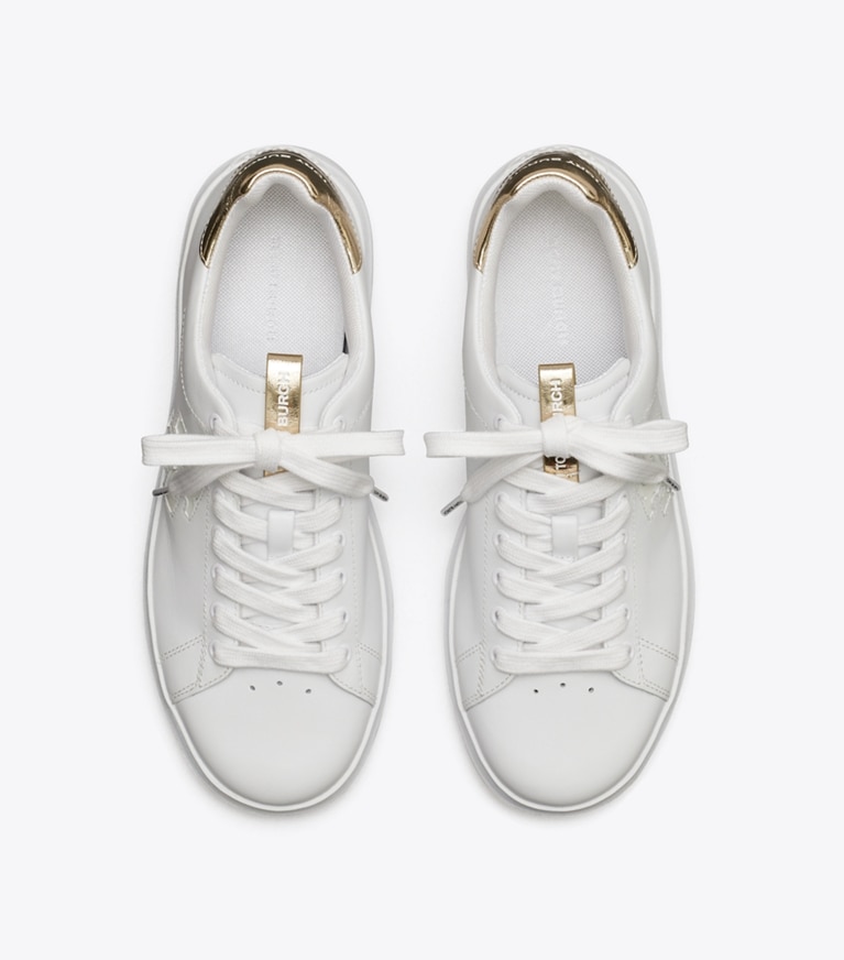 Tory Burch designer sneakers Howell Court Sneaker in Titanium White / Spark Gold angle