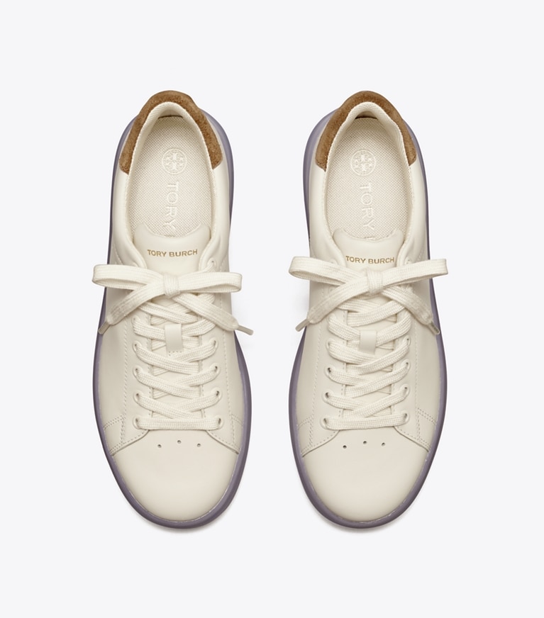 Tory Burch designer sneakers Howell Court Sneaker in NEW IVORY / TAUPE angle