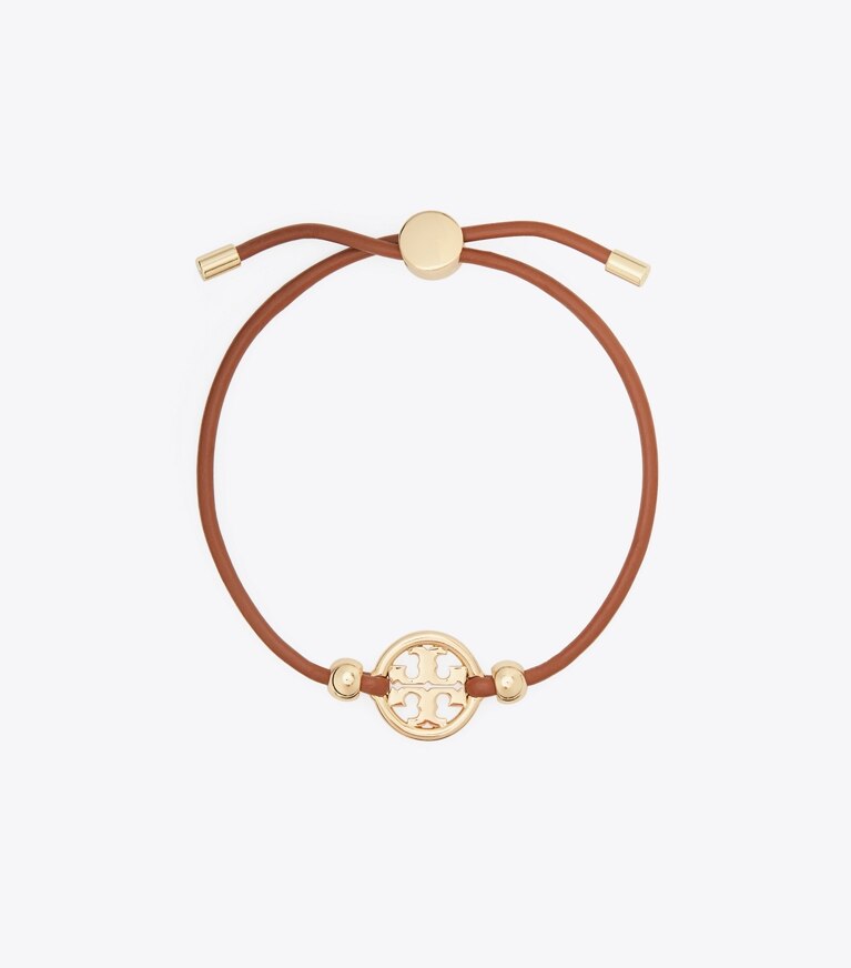 Tory Burch designer armbänder Icon Armband mit Schiebeverschluss in Tory Gold / Cuoio front