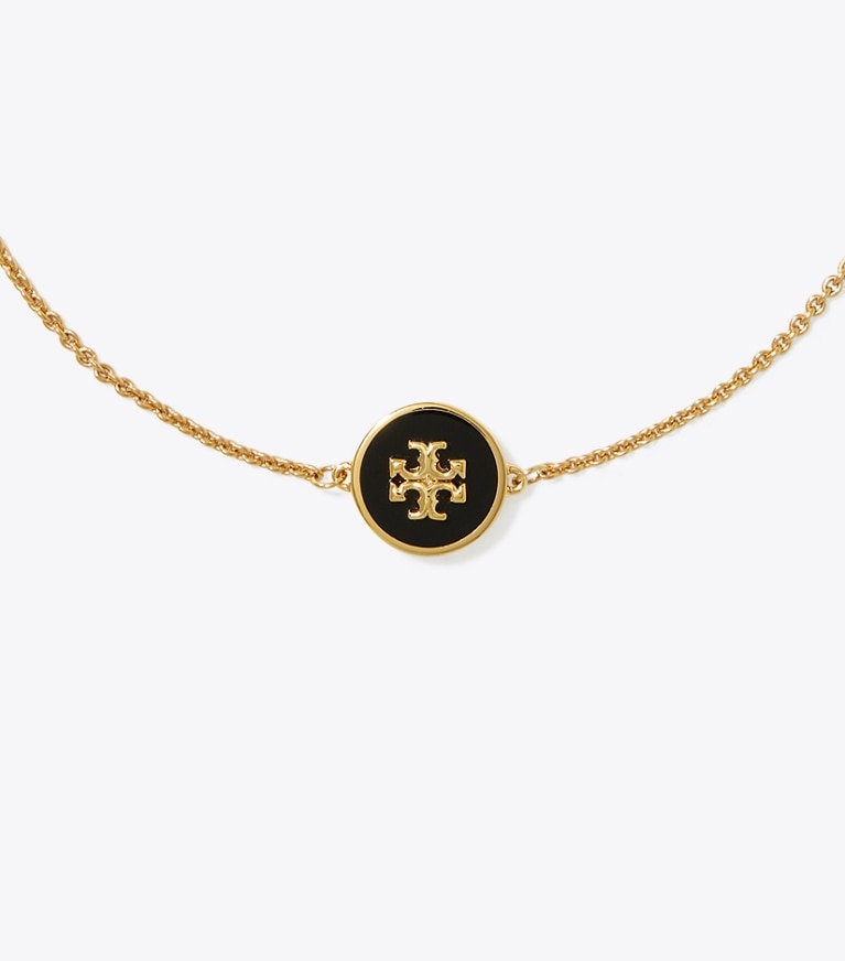 Tory Burch designer ブレスレット キラ エナメル チェーン ブレスレット in Tory Gold / Black front