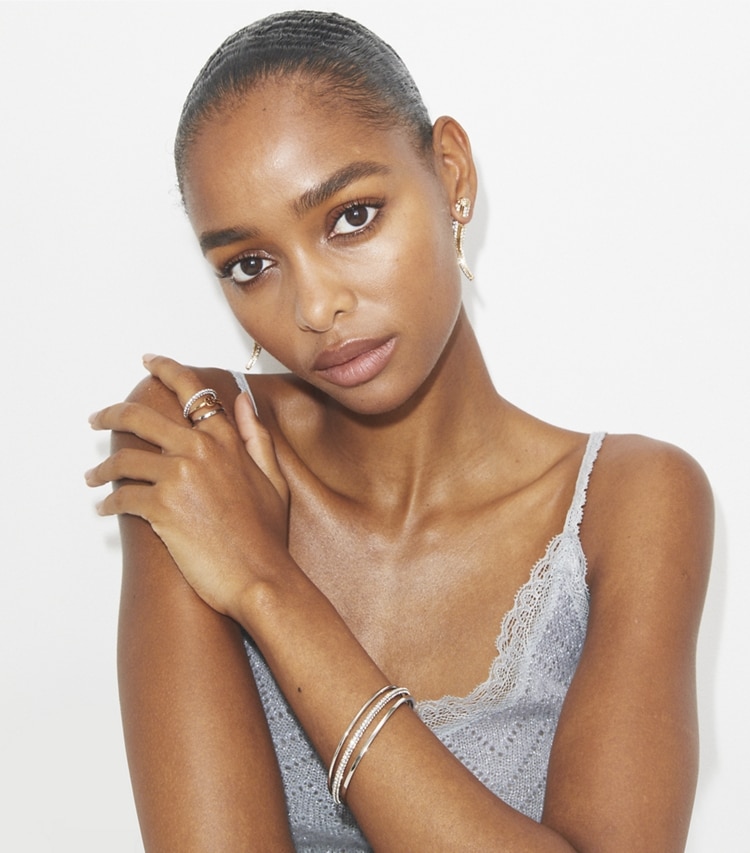 Tory Burch designer bracelets Icon Pavé Cuff in Tory Silver / Tory Gold / Crystal accessory on model