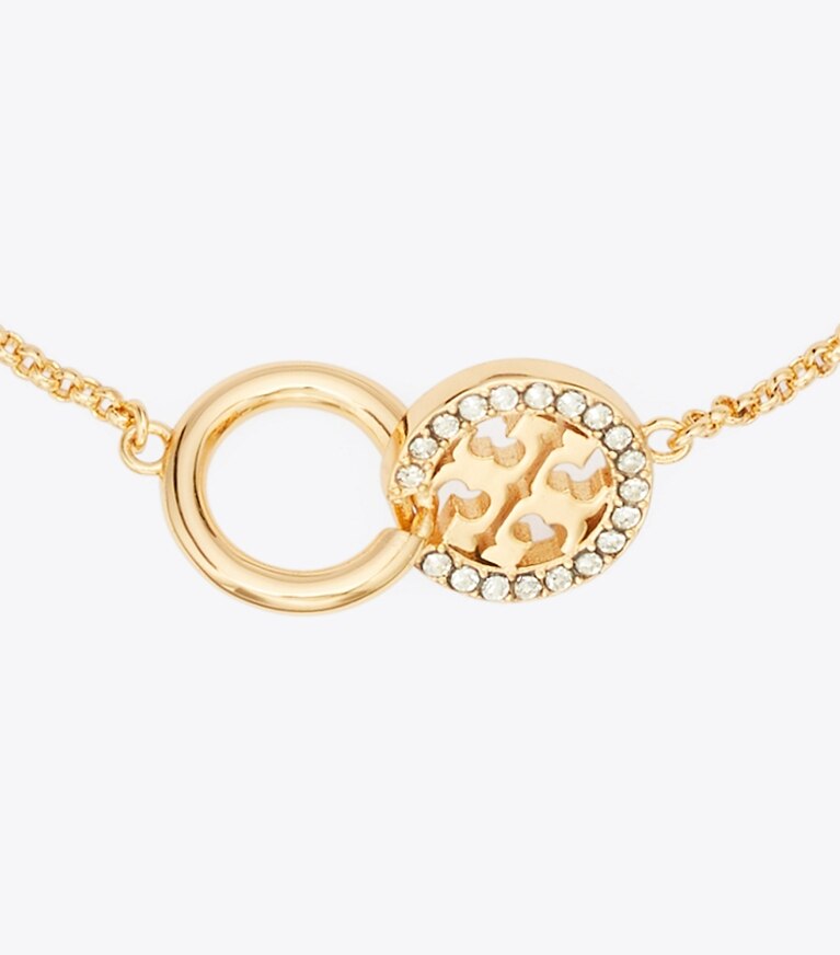 Tory Burch designer armbänder Icon Pavé-Gliederarmband mit ineinandergreifenden Elementen in Tory Gold / Crystal front