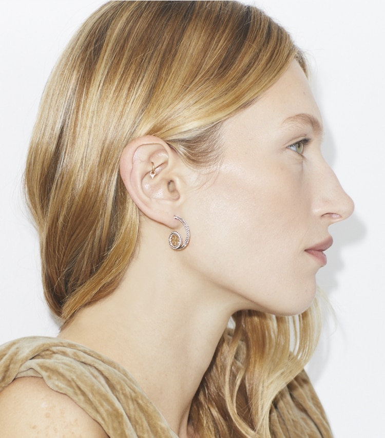 Tory Burch designer earrings Icon Pavé Loop Earrings in Tory Gold / Crystal accessory on model