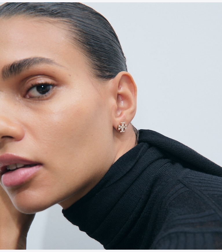 Tory Burch designer earrings Icon Pavé Stud Earrings in Tory Silver / Crystal accessory on model