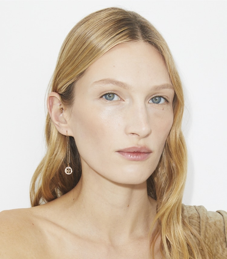 Tory Burch designer earrings Icon Pavé Threader Earrings in Tory Gold / Crystal accessory on model
