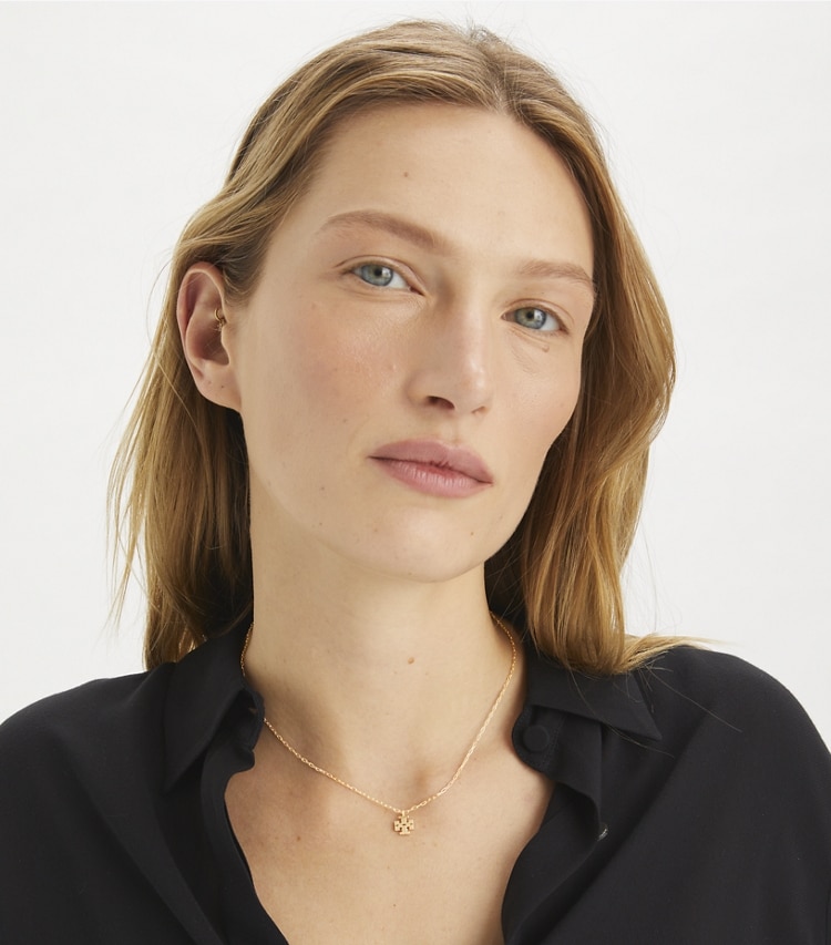 Tory Burch designer necklaces Icon Pendant Necklace in Tory Gold accessory on model