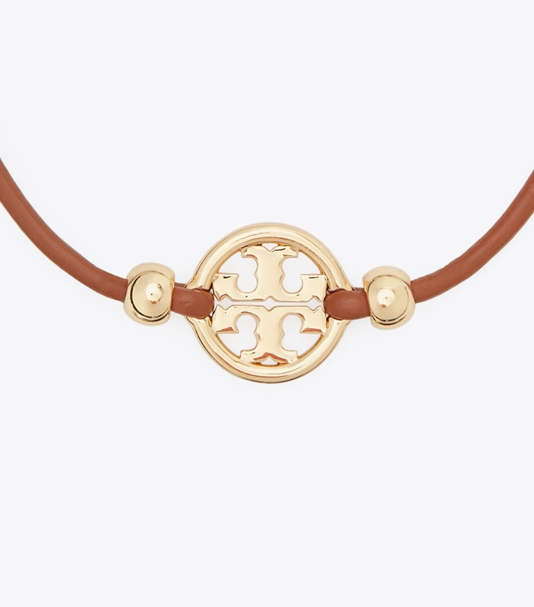 Tory Burch designer bracelets Icon Slider Bracelet in Tory Gold / Cuoio front
