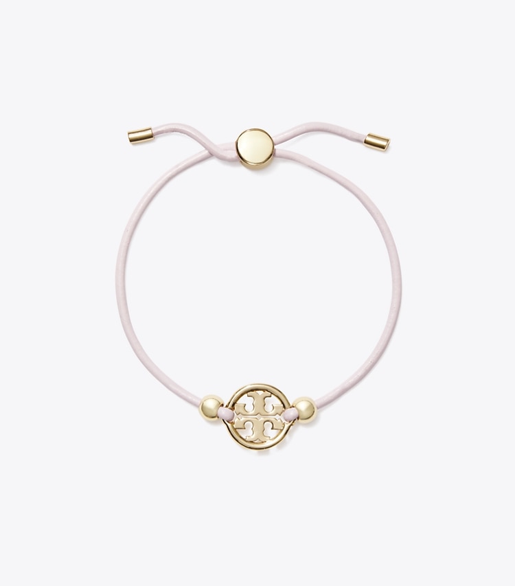 Tory Burch designer ブレスレット ミラー スライダー ブレスレット in Tory Gold / Pink front