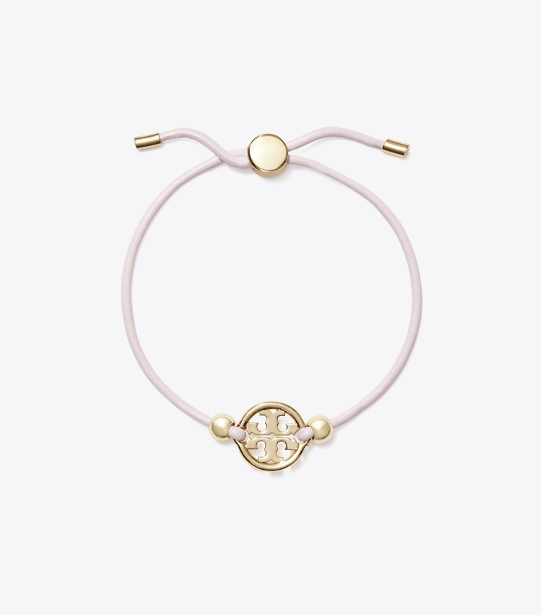 Tory Burch designer ブレスレット ミラー スライダー ブレスレット in Tory Gold / Pink front