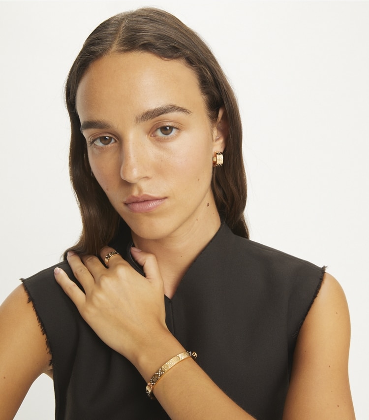 Tory Burch designer bracelets Icon T Monogram Pavé Hinge Bracelet in Tory Gold / Crystal accessory on model