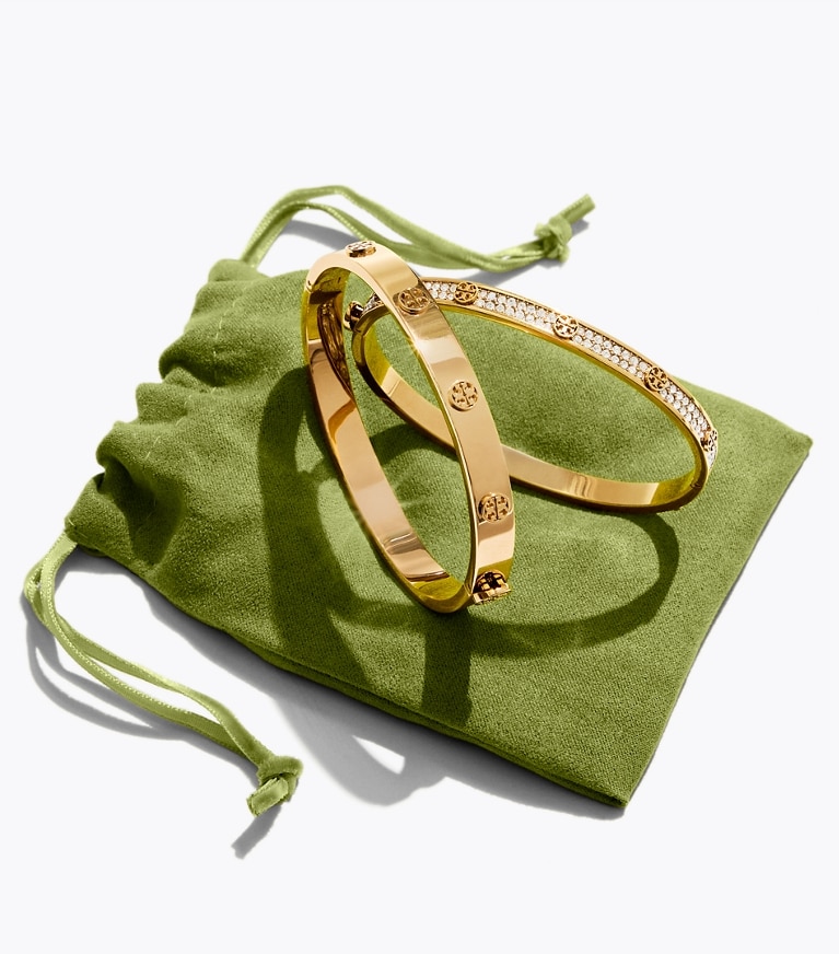 Tory Burch designer bracelets Icon Thin Hinge Bracelet in Tory Gold editorial