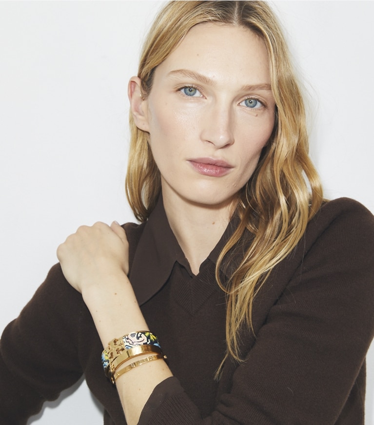 Tory Burch designer bracelets Icon Wide Bracelet in Tory Gold / Acrobats Pink front