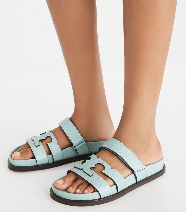 Tory Burch designer sandals Ines Sport Slide in SKY accessory on model