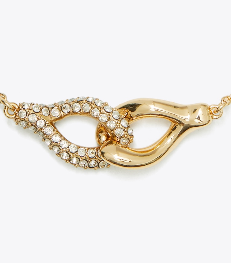 Tory Burch designer ブレスレット インターロッキング ウィッシュボーン ブレスレット in Tory Gold / Crystal front