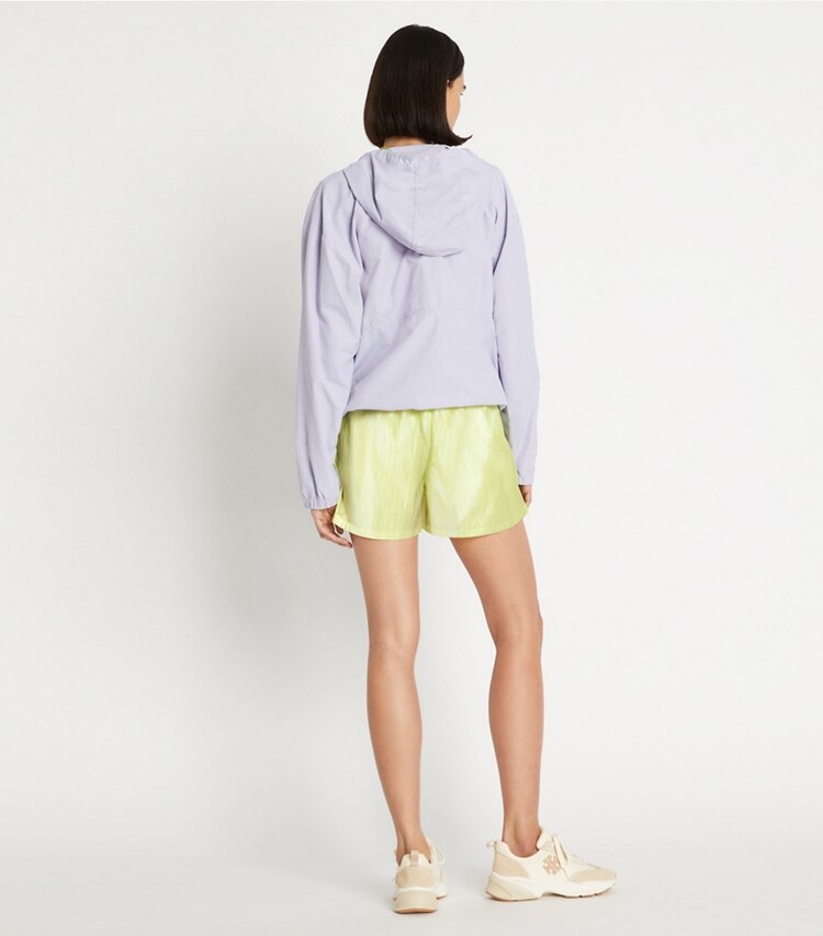 Tory Sport designer bottoms Iridescent Poly Taffeta Short in Irredescent Lemon Glow on model back