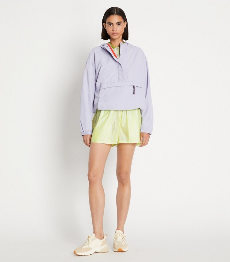 Tory Sport designer bottoms Iridescent Poly Taffeta Short in Irredescent Lemon Glow on model front