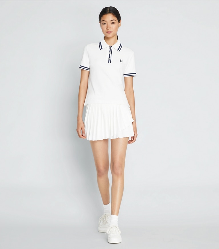Tory Sport designer bottoms Jacquard Performance Jersey Pleated Overlay Skirt in Snow White front