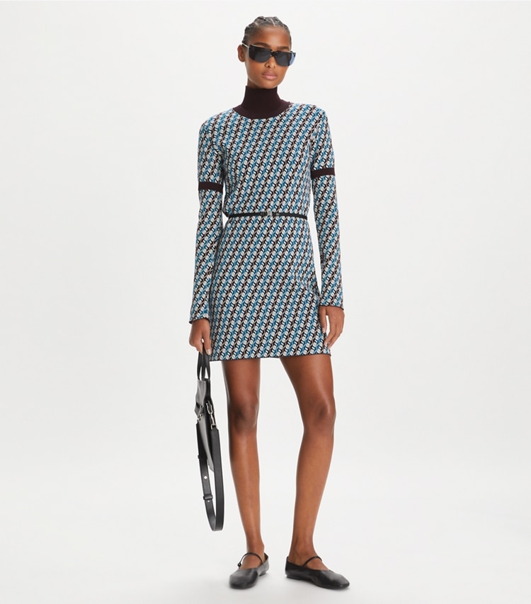 Tory Sport designer dresses Jacquard Sweater Dress in Aqua Blue Linked Geo 3 Color on model front