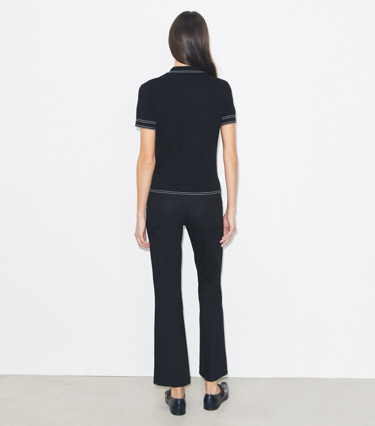 Tory Burch diseñador prendas inferiores Jean acampanado recortado en Black parte posterior en modelo