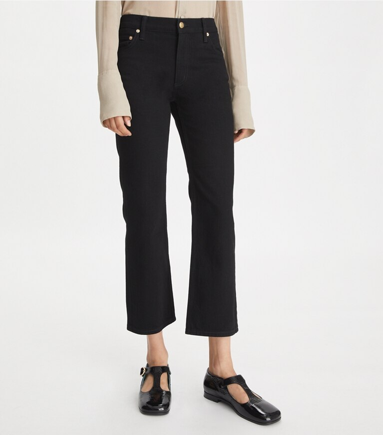 Tory Burch designer bas Jean coupe 7/8 légèrement évasé in Black Rinse Wash front